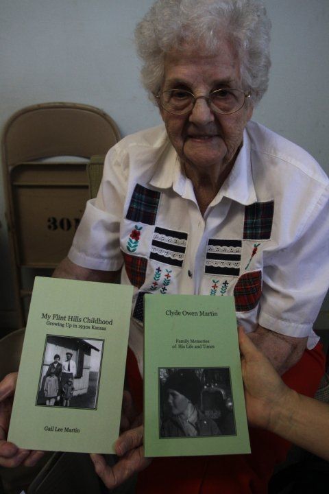 Gail Lee Martin with her two self-published books.