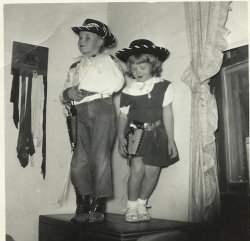 1950s children in cowboy costume