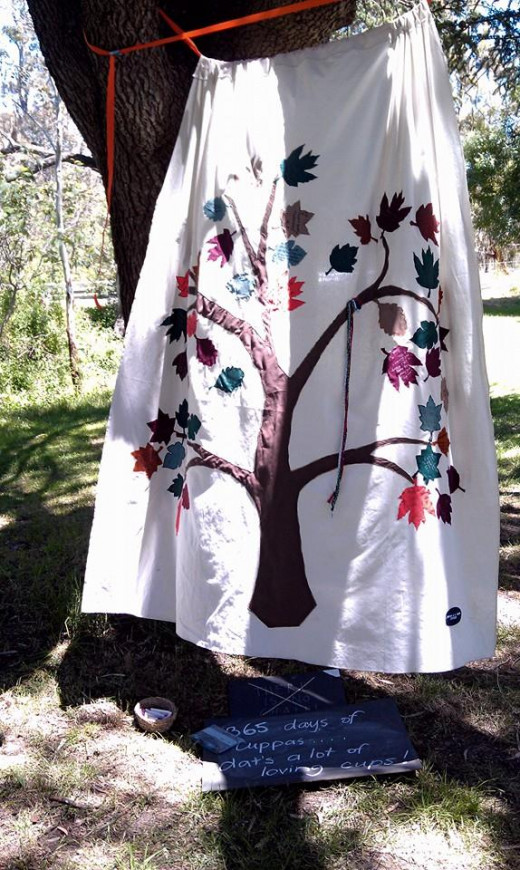 Tree quilt being used as a photo backdrop at our anniversary picnic