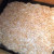 Make a pan of thin Rice Krispy treats on a sheet of wax paper.