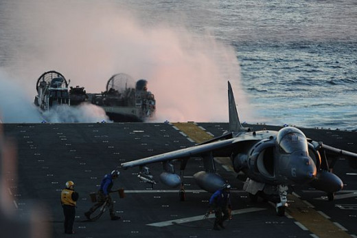 USMC AV-8B and LCAC (US Navy Photo/Michael Lieberknecht)