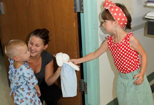[Photo: Wish.org] -- Tracy Lauren (cancer, age 4) wishes to give back comfort and hope.