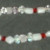 Crystals and glass beads on elastic Crystals and glass beads on elastic
