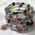 This fabulous coil bracelet was commissioned by a client. It features a mix of vintage beads and contemporary glass beads in cool colors. This fabulous coil bracelet was commissioned by a client. It features a mix of vintage beads and contemporary glass beads in cool colors.