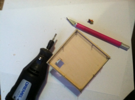 You'll need the drill and E-Xacto or a Dremel