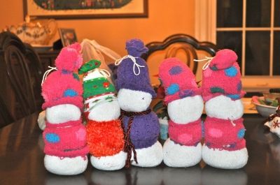 A family of sock snowmen ready for decorations.