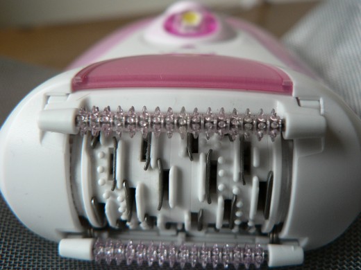An epilator pulls hair out by the roots.