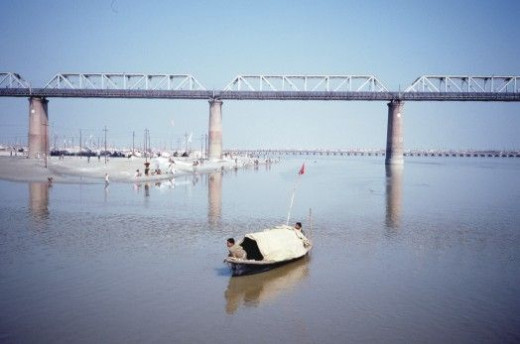 Police patrolling the mela by boat.