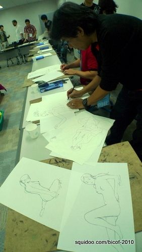 Nude croquis sketching session. Those are my 3-minute sketches in the foreground.