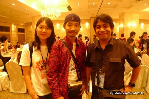 Arnold with volunteer interpreter Lee Yuna and comic artist Tsolmonbayar Batbaatar (Mongolia).
