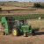 A John Deere Round Baler in the hay field