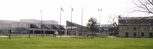 The Kansas Historical Society complex from the access road.  Apologies for the bad photo quality. The camera had to be pointed into the afternoon sun.