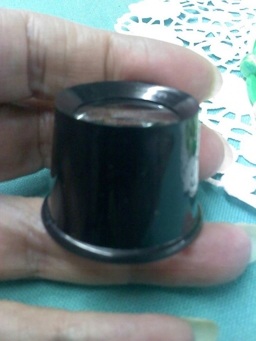 Jewelry loupe used in photo examples