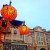 Mediterranean Harbor decorated with Halloween lights. The building in the park is a Disney Hotel called Hotel Miracosta.