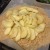 Putting 1/2 the apples onto the dough.
