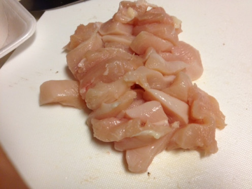 Cut up the chicken into bite-sized pieces and add them as well.