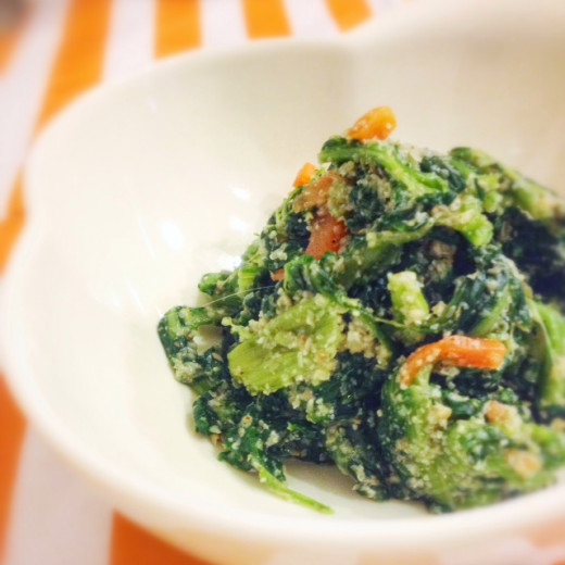 Spinach with carrots in sesame dressing.