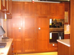 IKEA kitchen cabinets with full-height wood doors