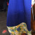 Blue apron with sunny flowers to sparkle up any blue cook. Blue apron with sunny flowers to sparkle up any blue cook.