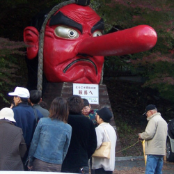 Giant tengu mask in front of Yuki shrine, Creative Commons 2.0 generic license