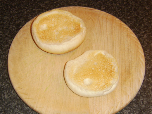 Lightly toasted bread roll halves