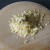 Grated cheese is seasoned with sage and black pepper