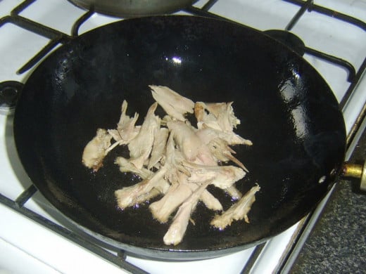 Stir frying turkey thigh meat