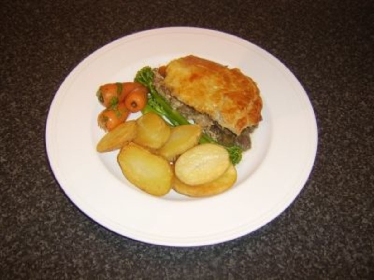 Guinea fowl and venison game pie with trimmings