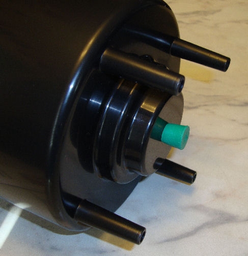 Plug the hole in the bottom of the large bowl.