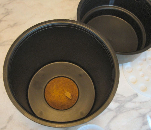 Then place the filter in the interior of the large bowl.