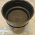 Add the water bowl to the top. A very small hole in the bottom of this bowl allows the water to drip into the bottom bowl without disturbing the coffee. Add the water bowl to the top. A very small hole in the bottom of this bowl allows the water to drip into the bottom bowl without disturbing the coffee.