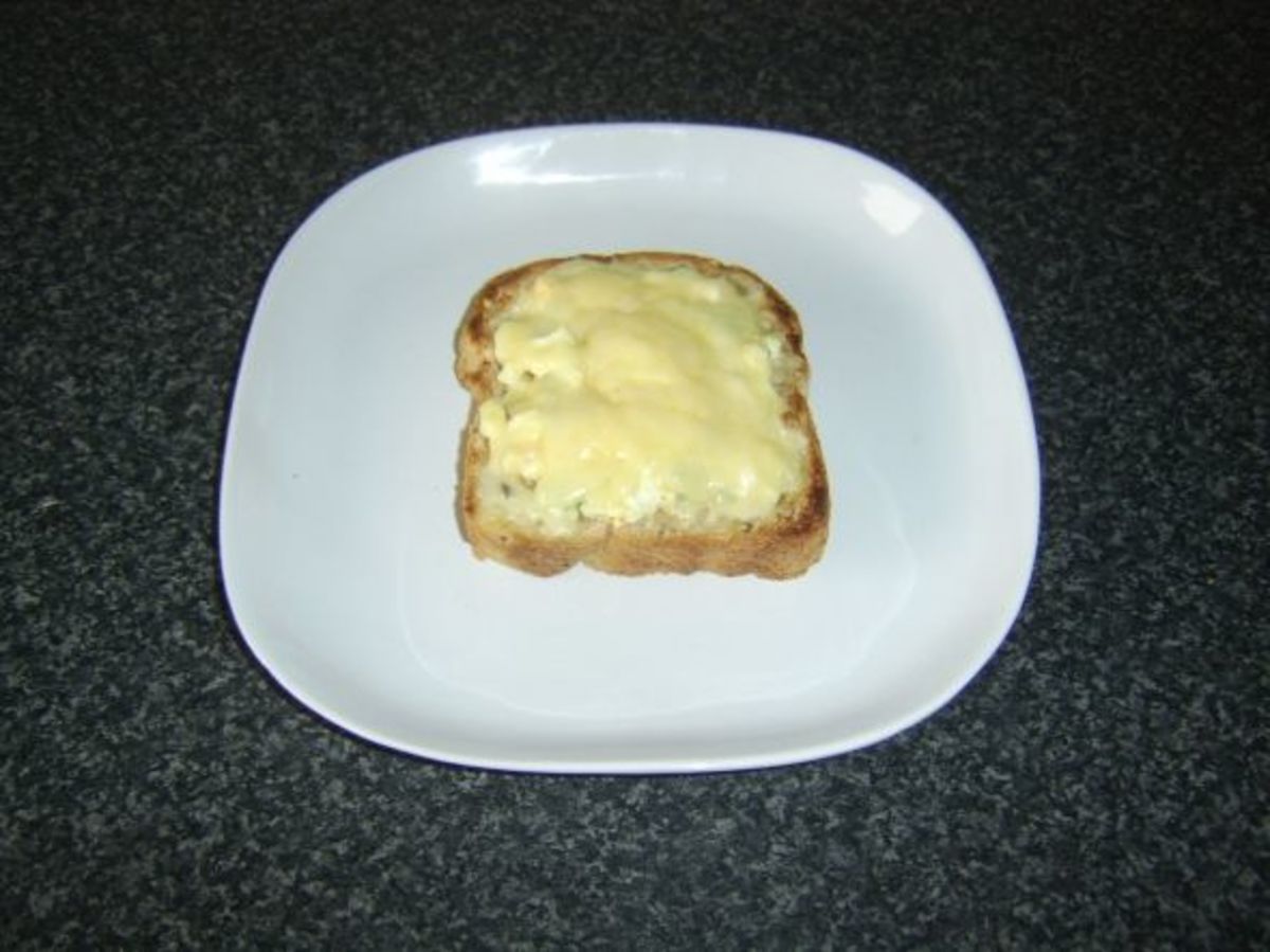 Cheese melted over egg and cress