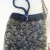 Cobblestone look with handsewn rhinestones give add a hint of sophistication to this hobo purse with an i-cord.