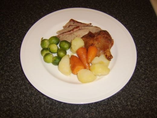 Roast duck and vegetable trimmings