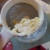 A very fine strainer will catch the butter fat and allow it to make bigger clumps. A very fine strainer will catch the butter fat and allow it to make bigger clumps.