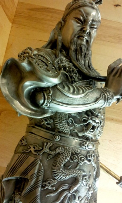 Pewter figurine of a Chinese warrior. This is quite a big piece standing over 2 feet tall.