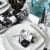 Black Christmas decorations and black and white (after dark) themed dinner table decorations and accessories, from crackers and place cards, to dinner games and party poppers.By www.soraiseyourglasses.com