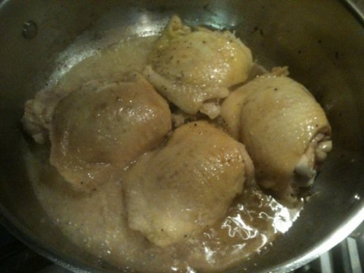 The chicken thighs are cooking nicely.
