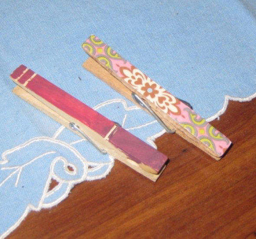 My grandson painted the red clothespin, and I covered the other clothespin with scrapbook paper. This is just one example of an easy clothespin craft project.
