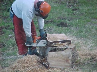 ...Here's one of me, cutting up bowl blanks...
