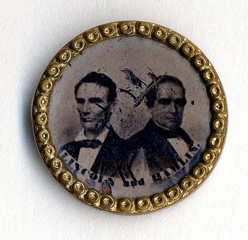 The Lincoln-Hamlin 1860 ticket portrayed on a campaign button.