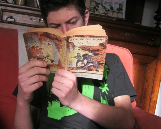 My son reading Stig
