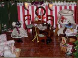 Mrs. Claus's sewing room, looks as if her Christmas frock is almost completed.