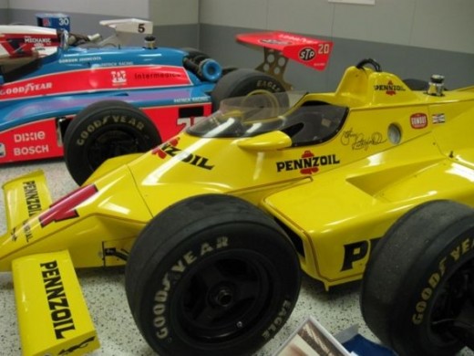 This is a Chaparral. It was Johnny Rutherford's 1980 winner. It was the first Indy car with ground effects to win.