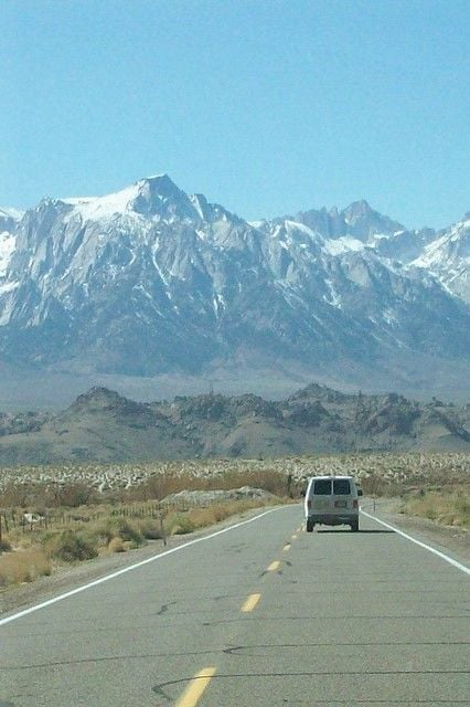 Driving toward Mt. Whitney and Lone Pine Peak on the Eastern Face of the Sierra Nevada, with the Alabama Hills at their base.