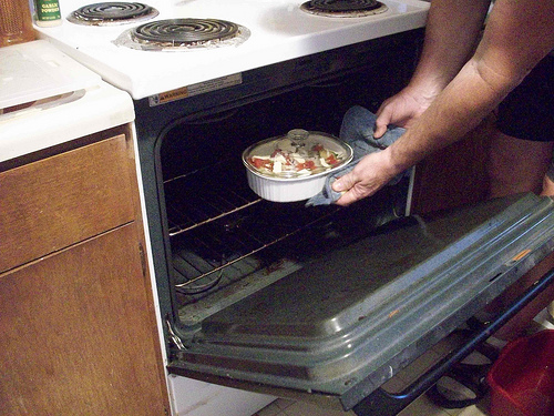 Sliding the Zucchini Dish into the Oven