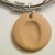 This shot was taken after stringing on the first bead and the pendant. This shot was taken after stringing on the first bead and the pendant.