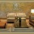 Lobby area is bright and airy with illumination from overhead skylight. Sofa, chairs, and ottman are upholstered leather and imported linen in complimentary brown, beige and rust colors. Lobby area is bright and airy with illumination from overhead skylight. Sofa, chairs, and ottman are upholstered leather and imported linen in complimentary brown, beige and rust colors.