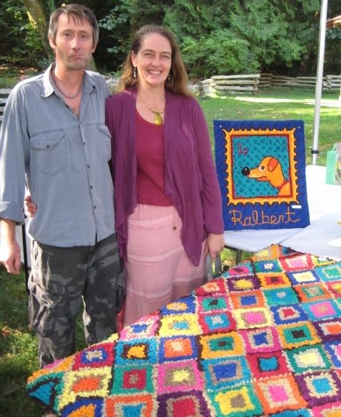 My hooked rug and picture at Bowfest (Hubby's pulling a face!)