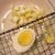 Then, peel the hard-cooked eggs and chop or use an egg slicer to slice the eggs before adding them to the salad bowl.